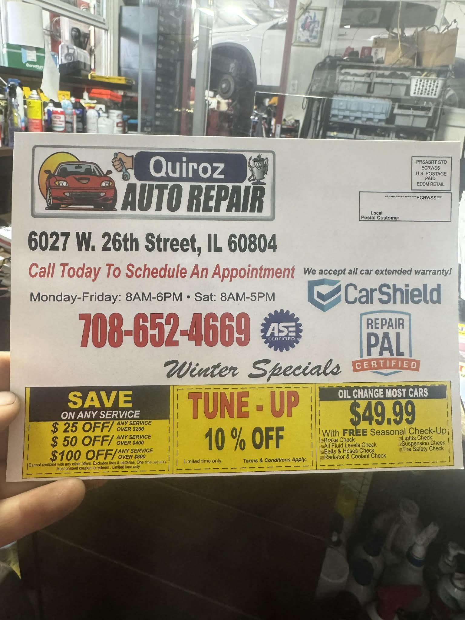 Tune-up 10% off and oil change special at Quiroz Auto Repair